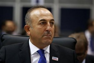 Turkish Foreign Minister Mevlut Cavusoglu attends at the opening session of the 22st OSCE Ministerial Council, in Belgrade, Serbia, Thursday, Dec. 3, 2015. Turkey's Foreign Ministry says the Turkish and Russian foreign ministers will meet on the sidelines of an Organization for Security and Cooperation meeting in the Serbian capital Belgrade. (AP Photo/Darko Vojinovic)