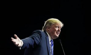 FILE - In this Oct. 8, 2015, file photo, Republican presidential candidate Donald Trump speaks at a rally, in Las Vegas. Israel's Prime Minister Benjamin Netanyahu on Wednesday, Dec. 9, 2015, rejected Trump's recent statements about Muslims, saying Israel "respects all religions" as he faced calls to call off an upcoming visit by the Republican front-runner. (AP Photo/John Locher, File)